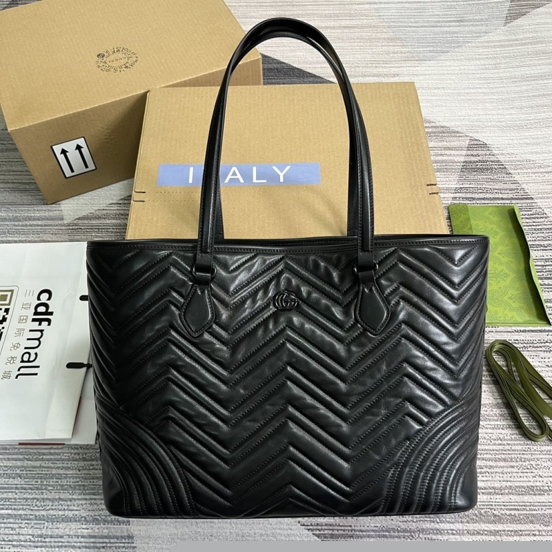 G*u*i shopping bags